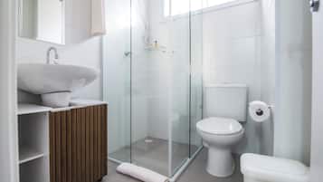 Shower, rainfall showerhead, towels, toilet paper