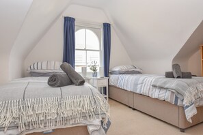 4 bedrooms, desk, iron/ironing board, travel cot