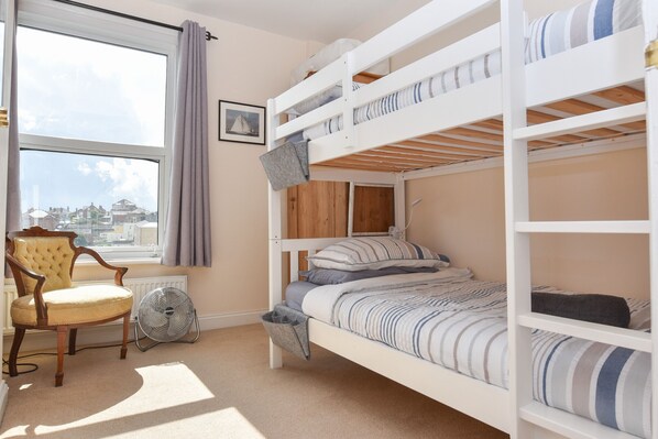 4 bedrooms, desk, iron/ironing board, travel cot