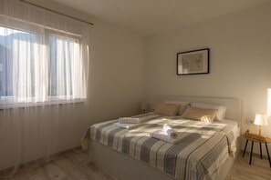 2 habitaciones, tabla de planchar con plancha, internet y ropa de cama 