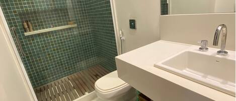 Shower, hair dryer, bathrobes, towels
