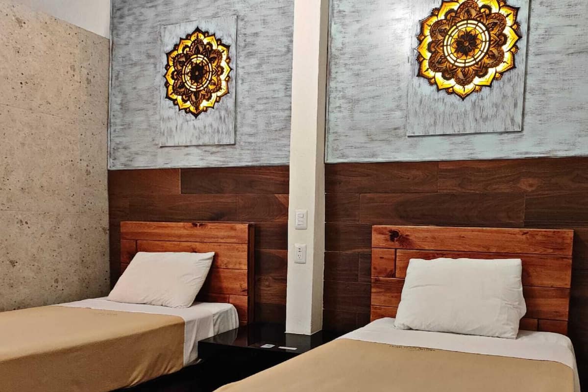 Room, 2 Twin Beds | 1 bedroom, down comforters, individually decorated