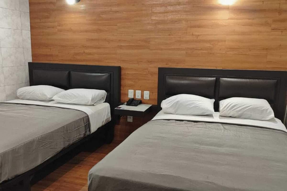 Room, 2 Double Beds | 1 bedroom, down comforters, individually decorated
