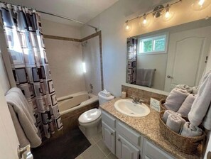Hair dryer, towels, soap, shampoo
