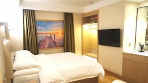 A hotel room with a bed, a desk, a TV, a painting, and a mirror. - Vienna Hotel Chengdu Dufu Cottage The Jinsha Site (Chengdu)