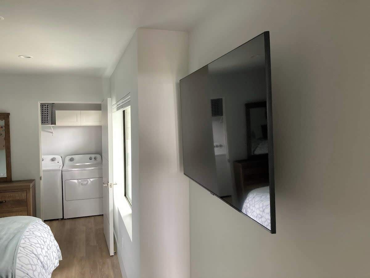 Large screen TV in bedroom as well as in great room.