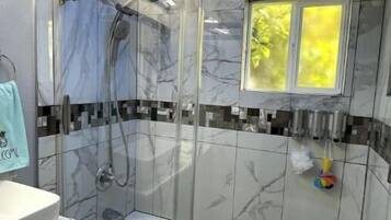 Hair dryer, bidet, towels, soap