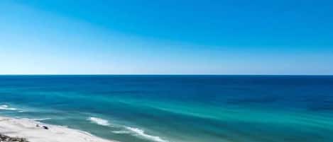 On the beach, sun-loungers