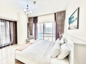 1 غرفة نوم ومكواة/لوح كي وملاءات أسرّة