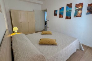 2 quartos, roupa de cama, acesso para cadeiras de rodas