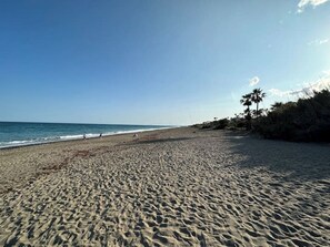 Beach nearby, sun loungers
