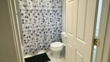 Hair dryer, towels, soap, shampoo