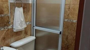 Shower, towels, soap, toilet paper