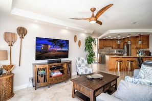 Luxury Condo | Living area | 80-inch Smart TV with digital channels, Hulu, streaming services - Elegant Oceanfront Vistas (Kihei)
