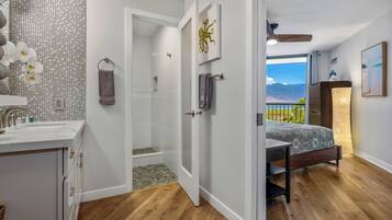 Luxury Condo | Bathroom | Shower, rainfall showerhead, free toiletries, hair dryer