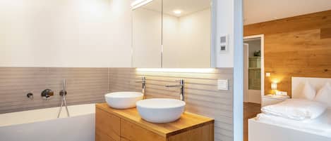 Bathtub, hair dryer, towels
