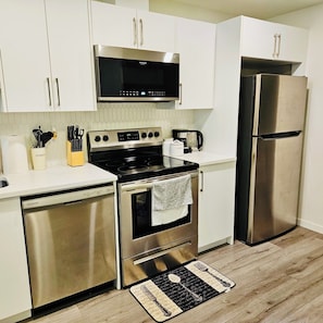 Fridge, microwave, oven, stovetop - Cozy 1 Bedroom Basement Apt in SE Calgary  (Calgary)