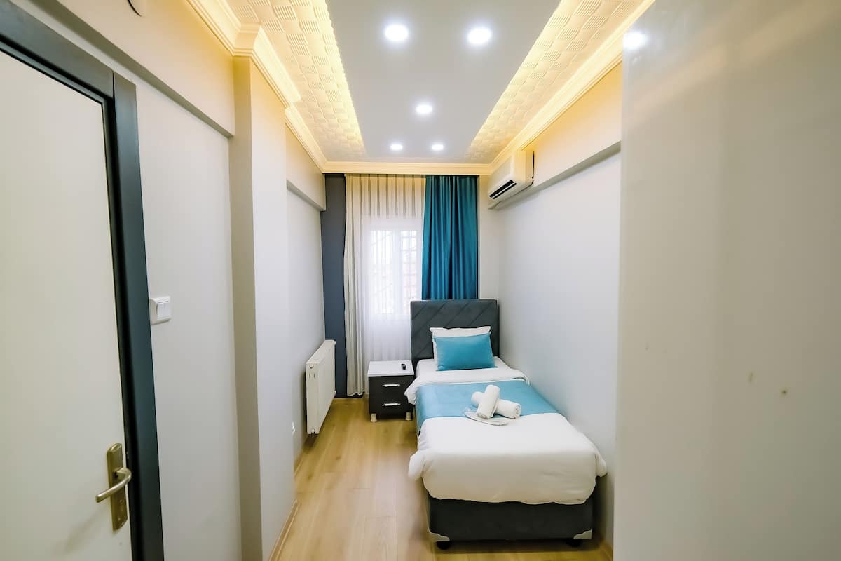 Chambre Simple Classique | 1 chambre, minibar, chambres insonorisées, Wi-Fi gratuit