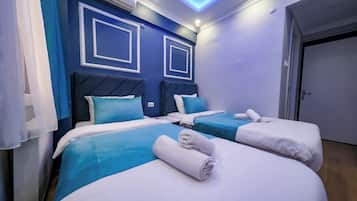 Chambre Deluxe avec lits jumeaux | 1 chambre, minibar, chambres insonorisées, Wi-Fi gratuit