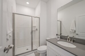 Bathtub, hair dryer, towels