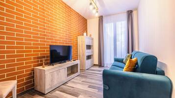 Luxury-Studiosuite | Wohnbereich | Smart-TV