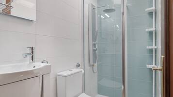 Bathtub, hair dryer, towels