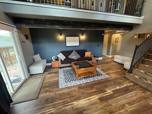 Smart TV, fireplace, books, offices