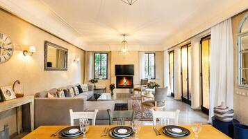 Deluxe Villa | Living area | Flat-screen TV