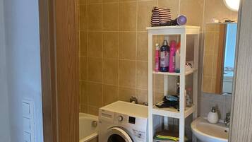 Hair dryer, towels, soap, shampoo