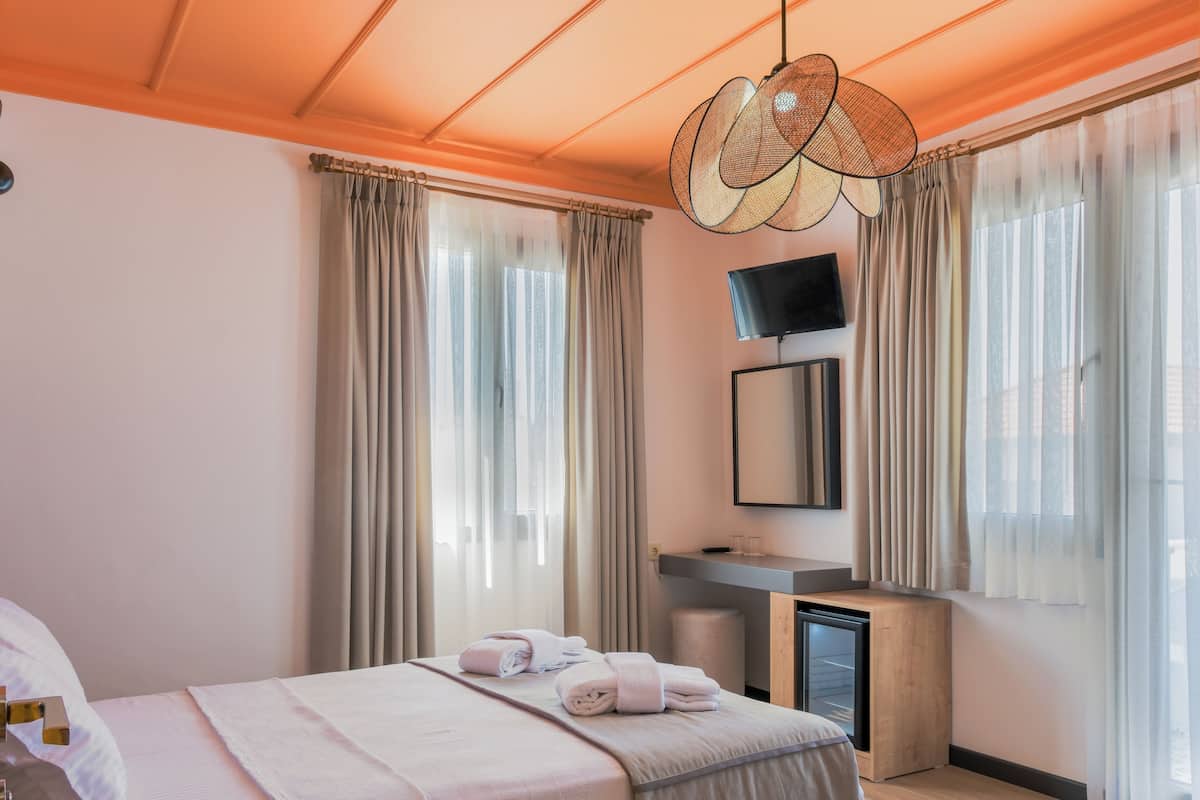 Suite Deluxe | 1 habitación, ropa de cama de alta calidad y minibar