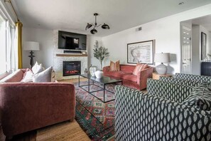 Smart TV, fireplace, books