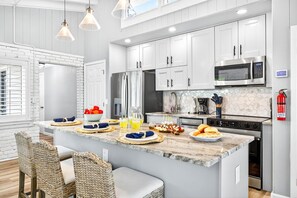 Fridge, microwave, oven, stovetop - Castaway Home | Indian Rocks Beach Waterfront Home with Private Pool (Indian Rocks Beach)