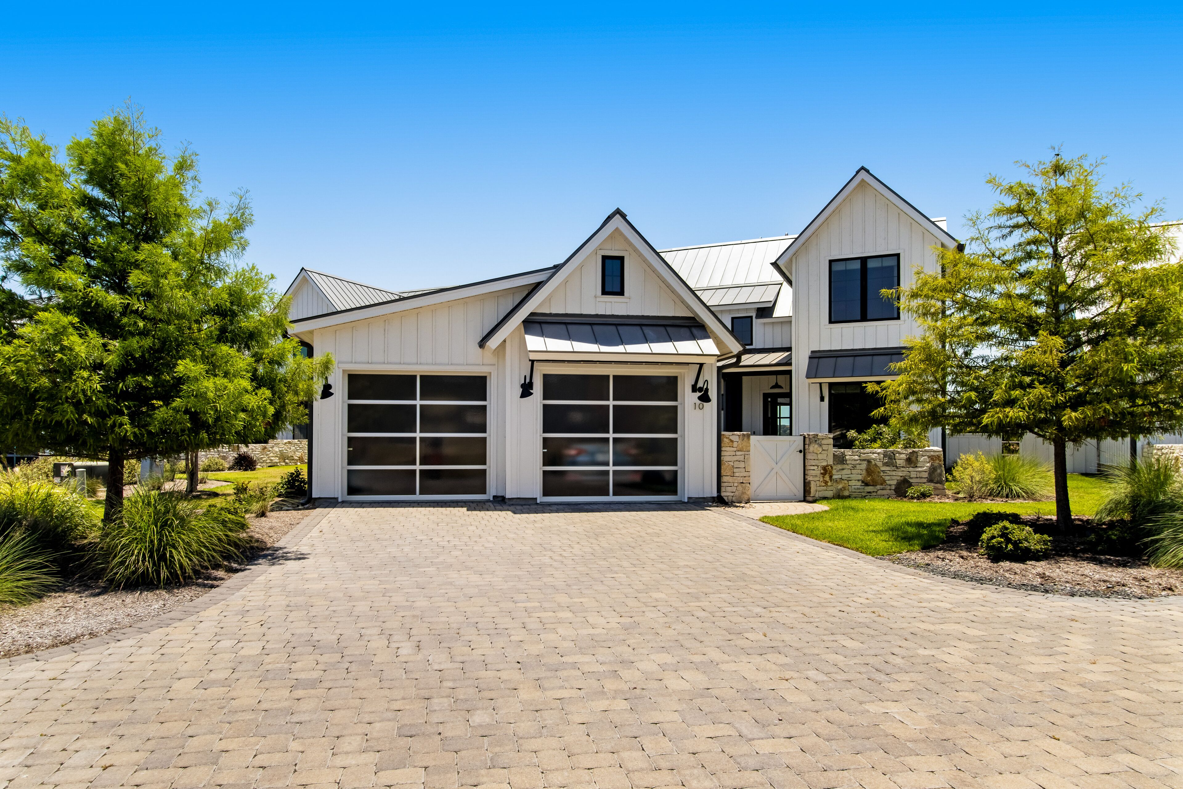 Modern lake-view farmhouse with alfresco patio, yard & WFH desk