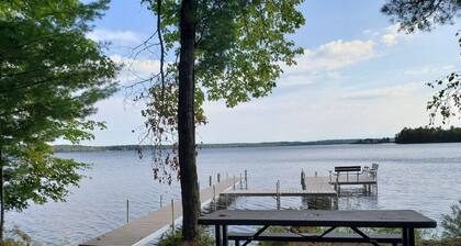 Exceptional log home on 9+ acres with frontage on Big St. Germain Lake