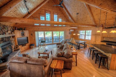 Exceptional log home on 9+ acres with frontage on Big St. Germain Lake