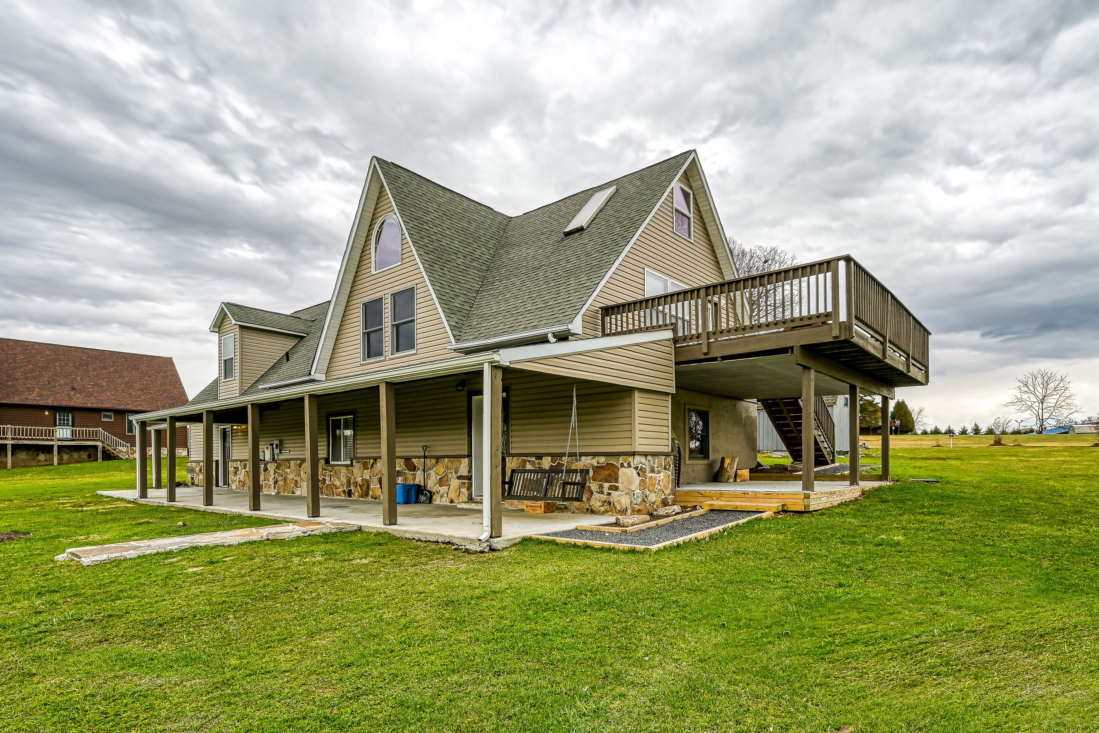 Adventurer's retreat with firepit, games, & kitchens - mountain views, dogs ok