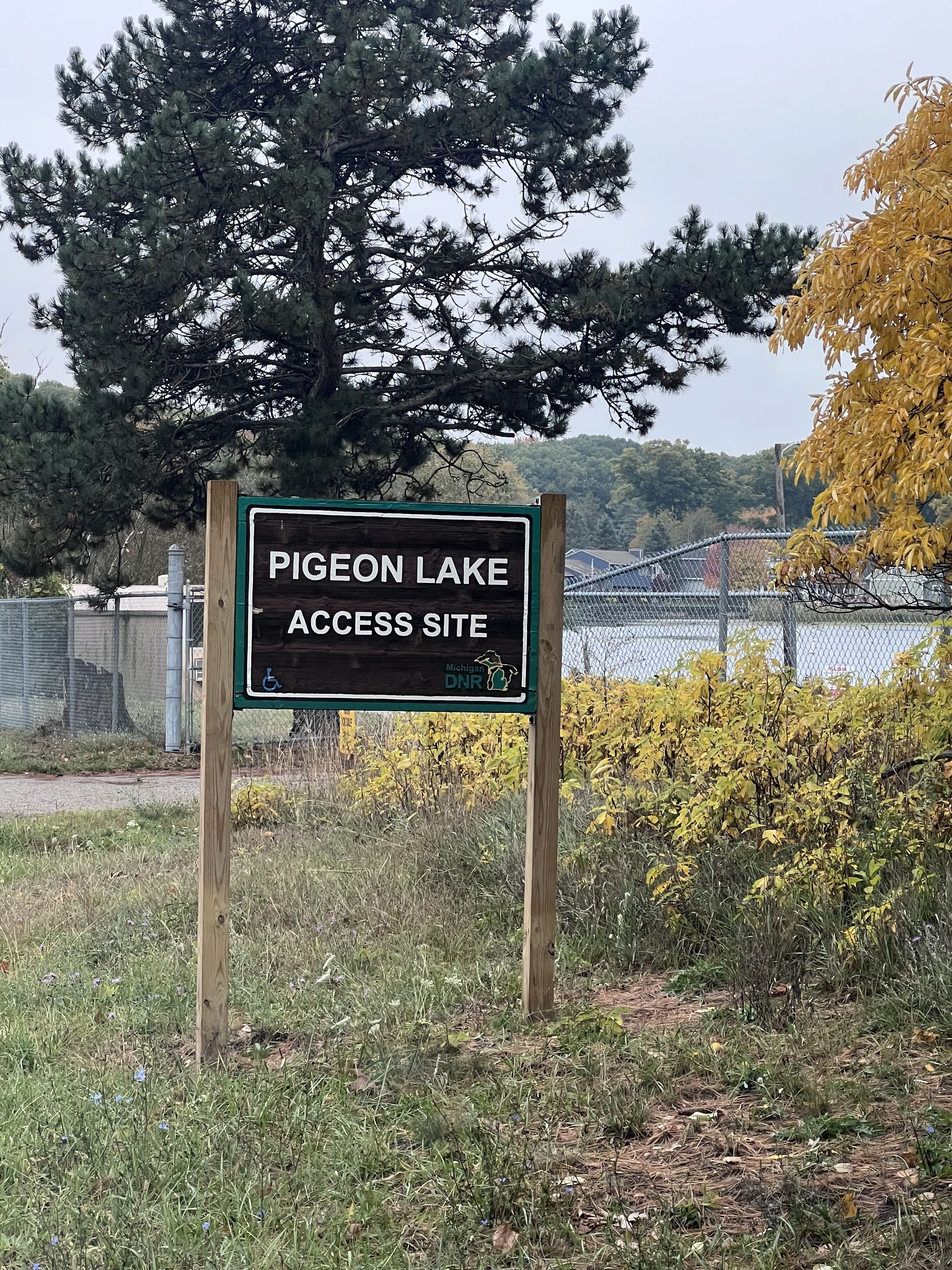 A sign for Pigeon Lake Access Site in Michigan.