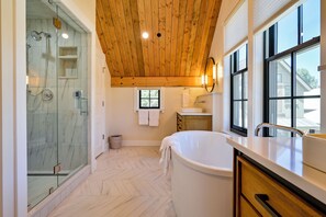 Bathtub, hair dryer, towels