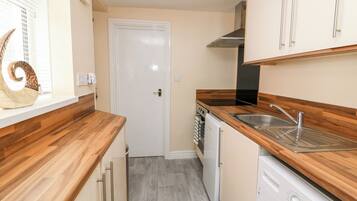 Fridge, toaster, cookware/dishes/utensils