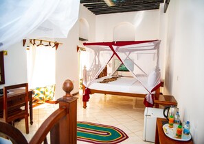 Luxe beddengoed, donsdekens, pillowtop-bedden, een minibar