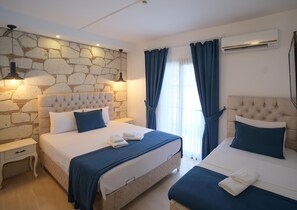 Habitación familiar con 1 cama matrimonial o 2 individuales | Ropa de cama de alta calidad, wifi gratis y ropa de cama