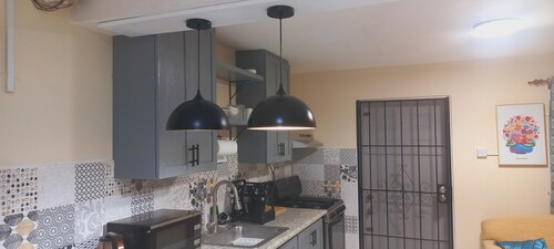 welcome to this cozy hideaway, nestled in the upscale area of Basseterre. 