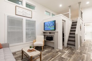 Deluxe Cottage | Living area | Flat-screen TV - Oceans RV Resort (Holly Ridge)