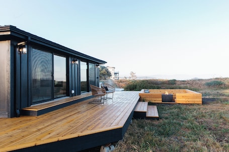 Terrace/patio. Lux Coastal Retreat & Hot Tub