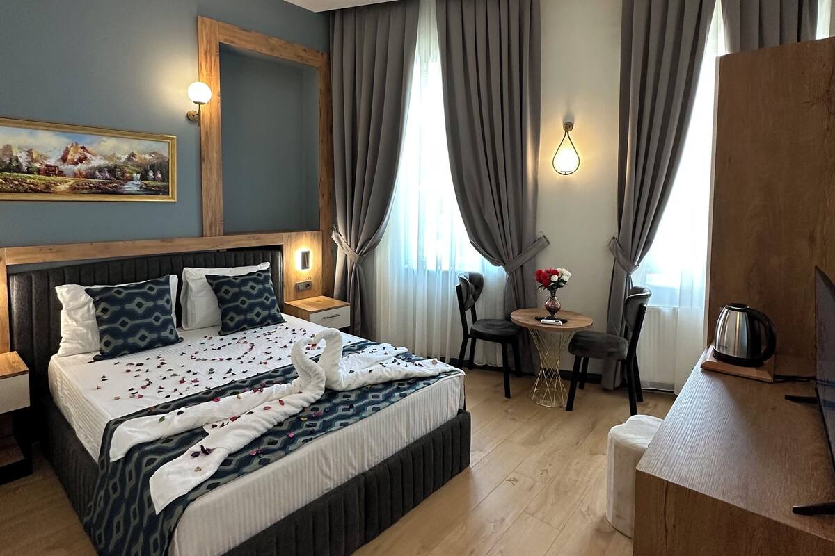 Premium bedding, minibar (free items), desk, laptop workspace