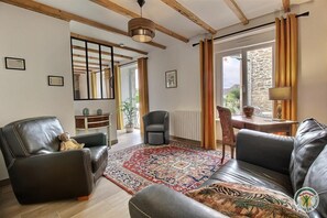 TV, fireplace, books, offices