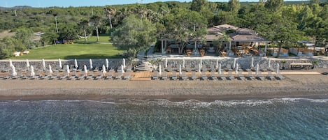Private beach, free beach shuttle, free beach cabanas, sun loungers