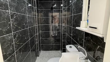 Hair dryer, towels, soap, shampoo