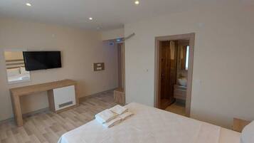 Desk, laptop workspace, free WiFi, bed sheets