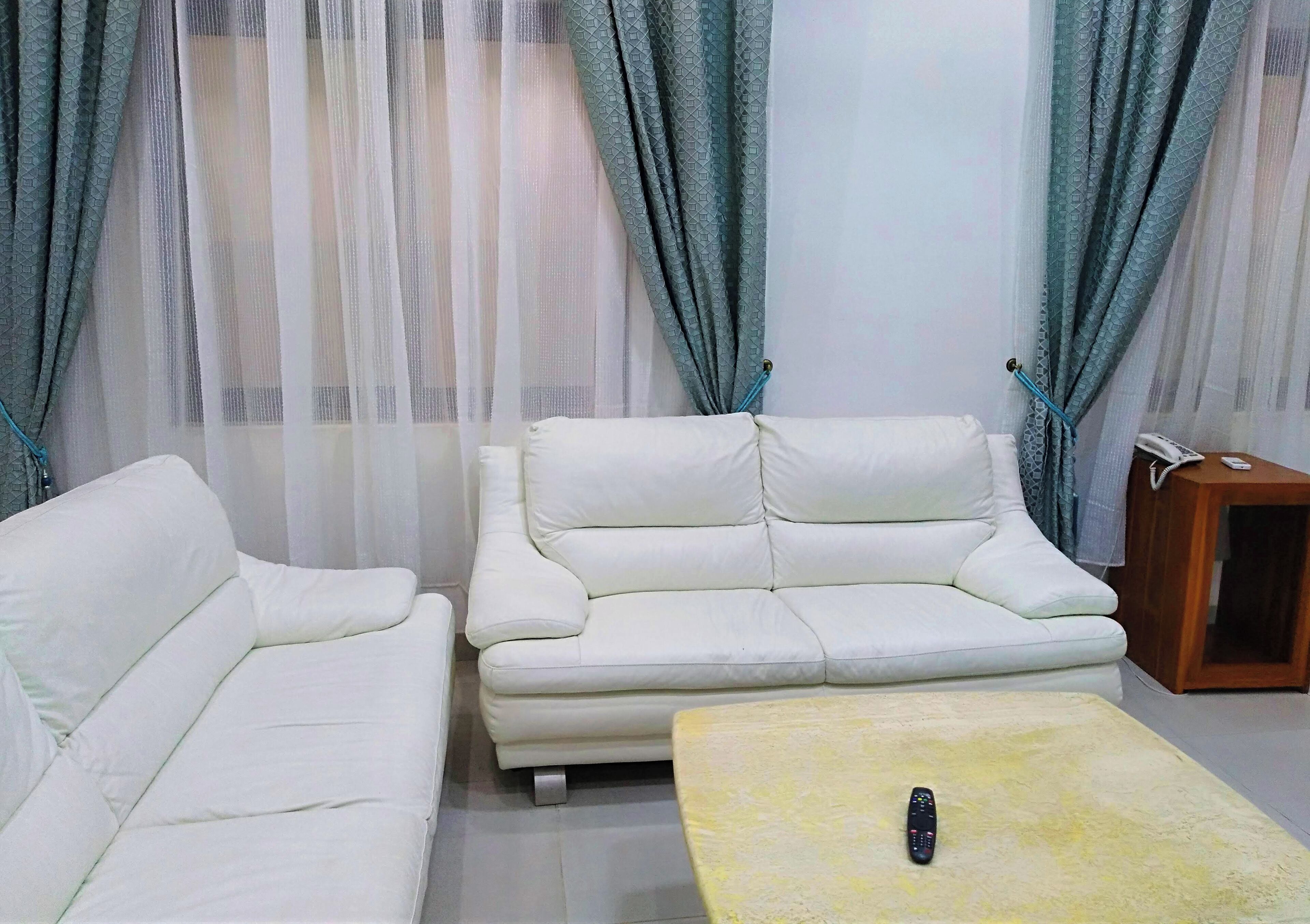 Comfort Apartment | Living area | Flat-screen TV